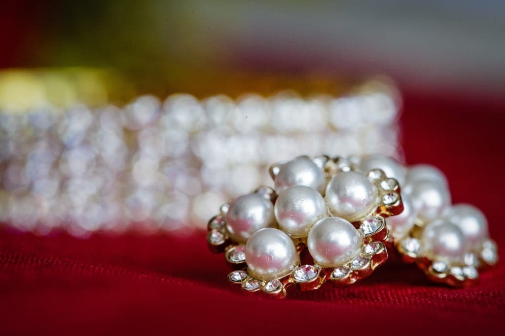Pearl statement earrings from a red and gold Chinese-American wedding