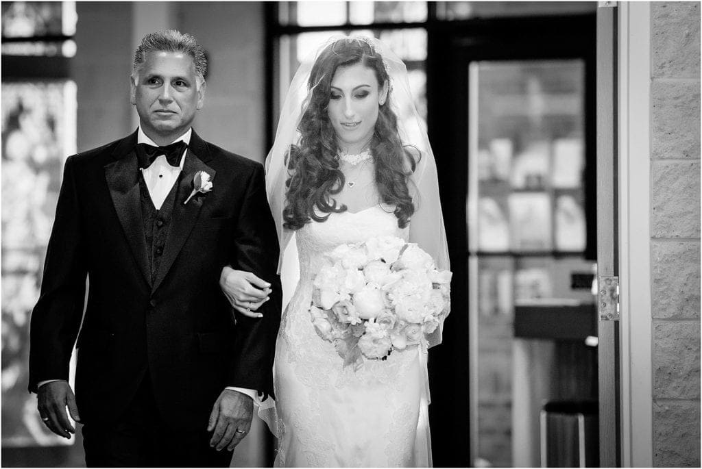 Taken moments before Diana & her father prepared to walk down the aisle, we love the expressions both of these two have on their faces!