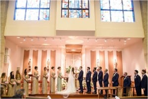 The entire bridal party at the altar of St Martin of Tours in New Hope, PA.