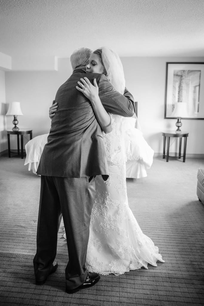 This tender moment remains pure and distraction free by Julianne's forethought to keep this room separate and tidy for her to get dressed in.