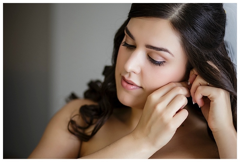 The final touches were put on as Sabrina donned her teardrop earrings for a little more sparkle.