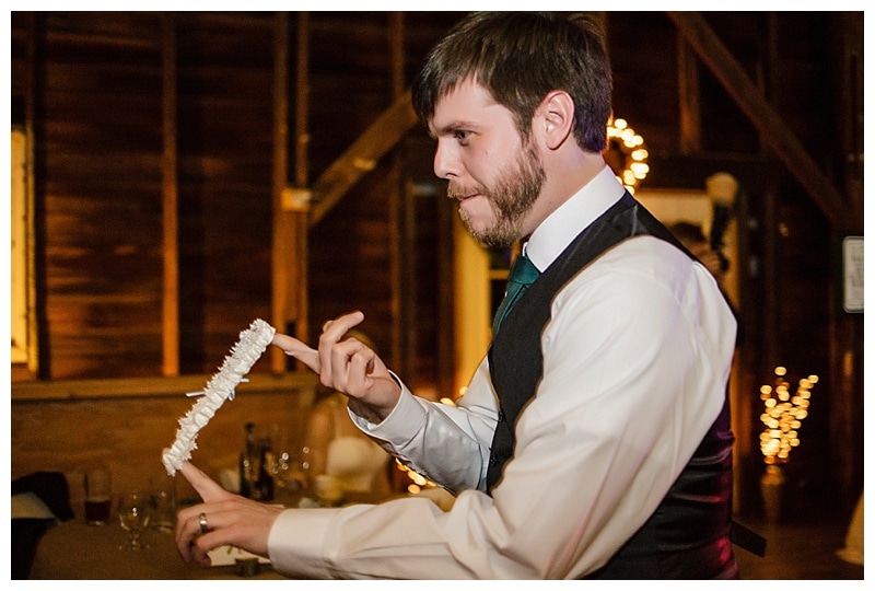 Scott looking somewhat devilish as he prepared to snap the garter away. 