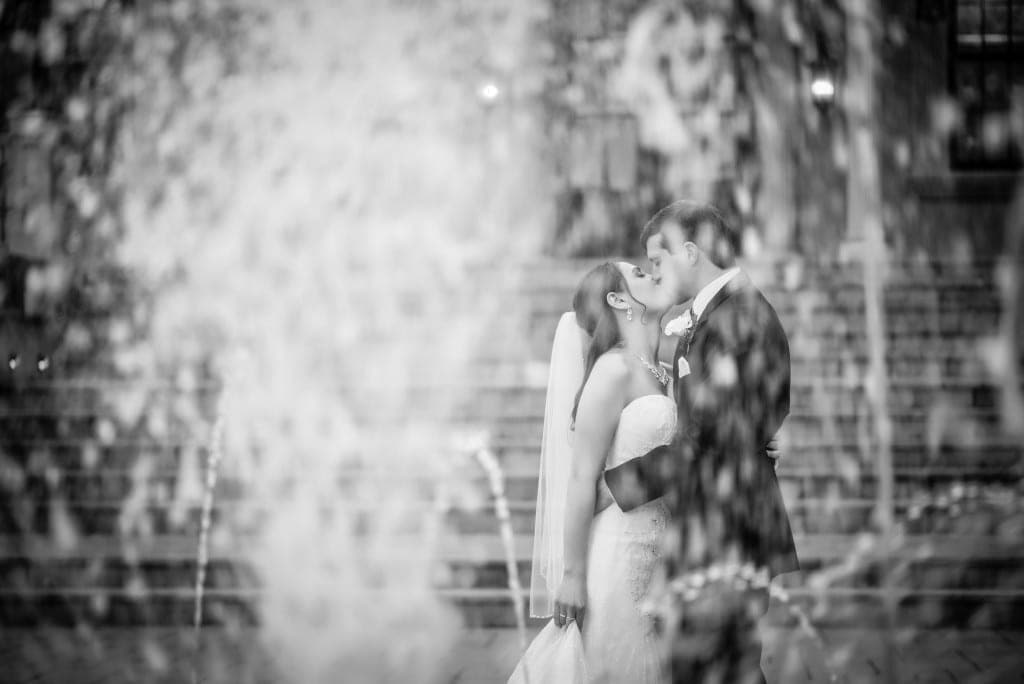 A romantic kiss shared in the midst of the fountains. Simply beautiful.