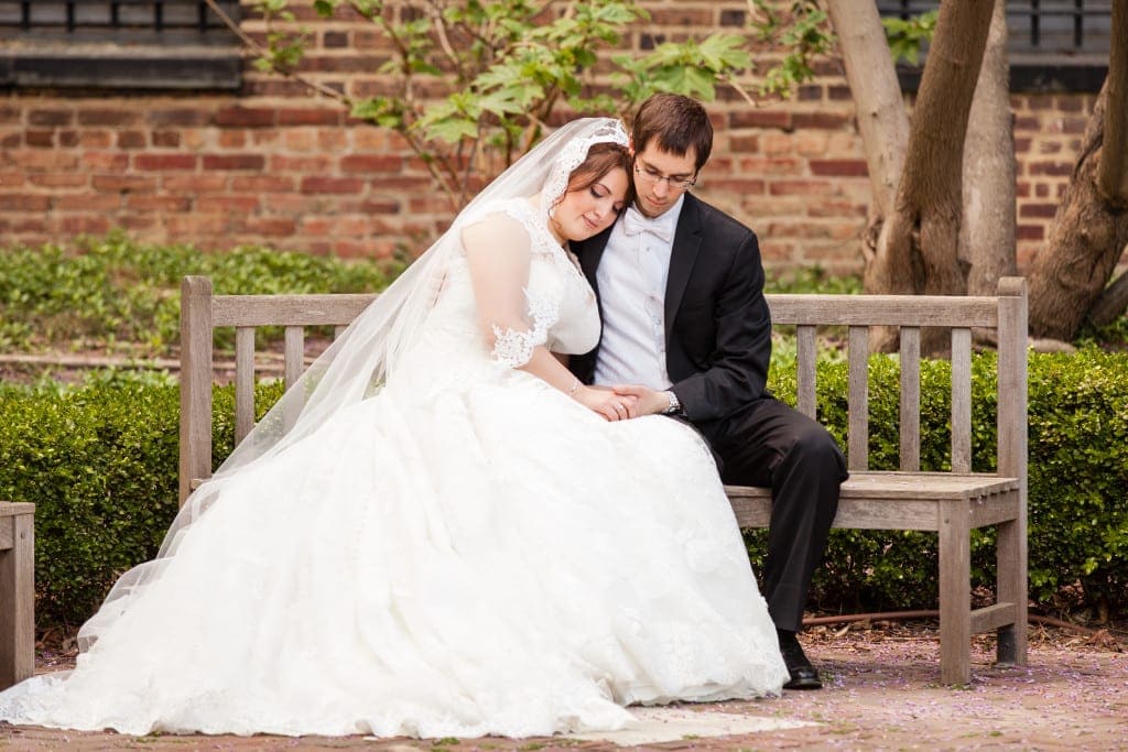 Mazell and Jared enjoying a quiet moment on a park bench.