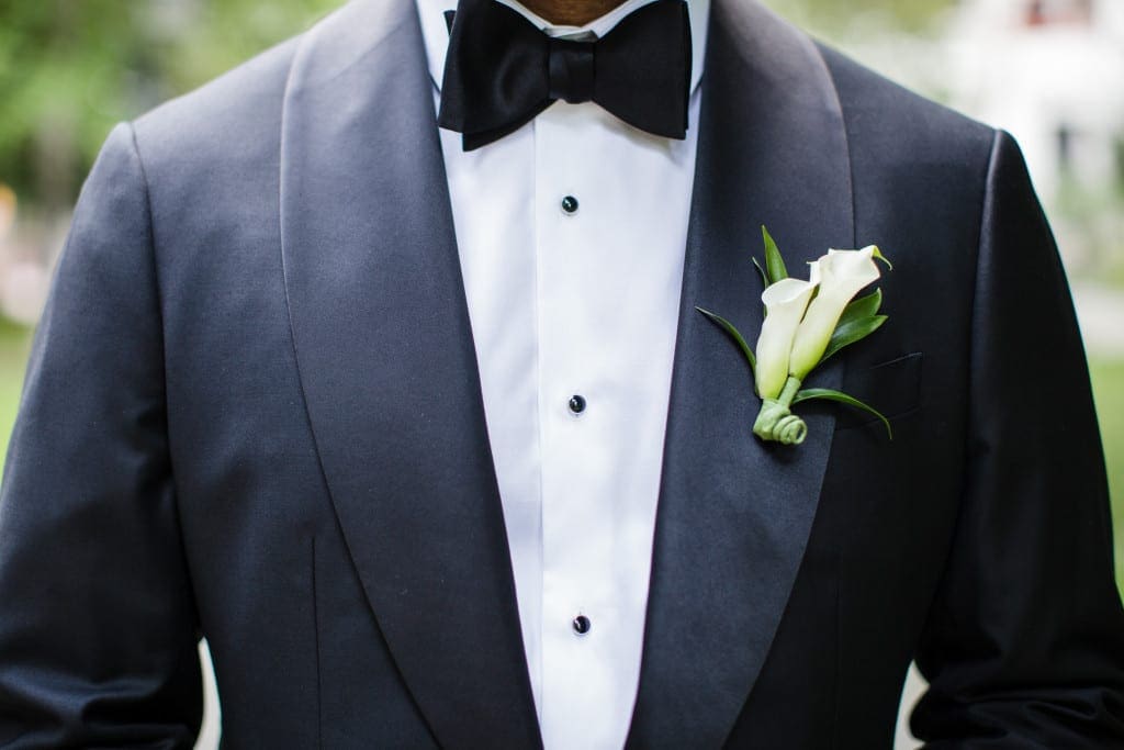 An impeccable handmade suit from Italy for our incredibly dapper groom. Complete with a calla lily boutonniere. 