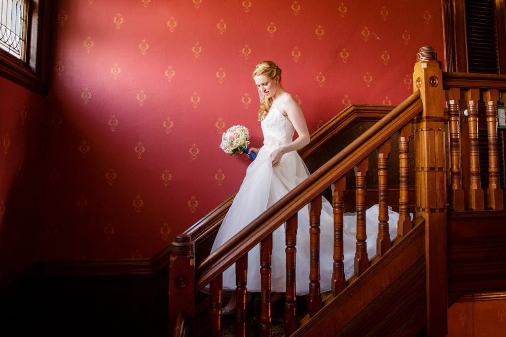 We swooned over this light as it fell perfectly on Catherine as she descended from her bridal suite to meet her love at the end of the aisle. 