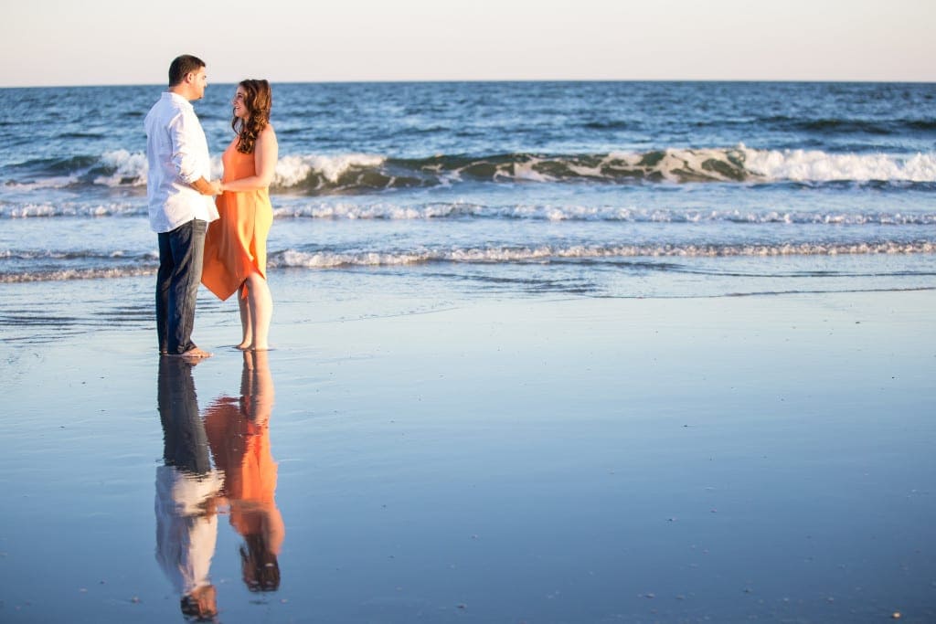 engagement pictures at the beach during sunset