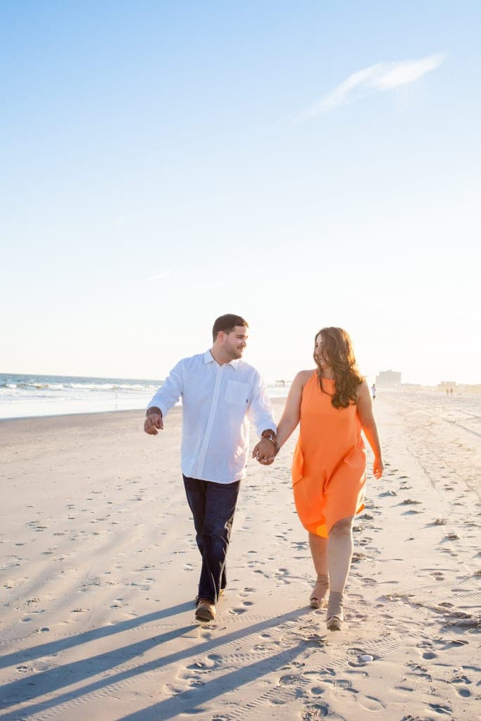 engagement pictures at the beach during sunset hour