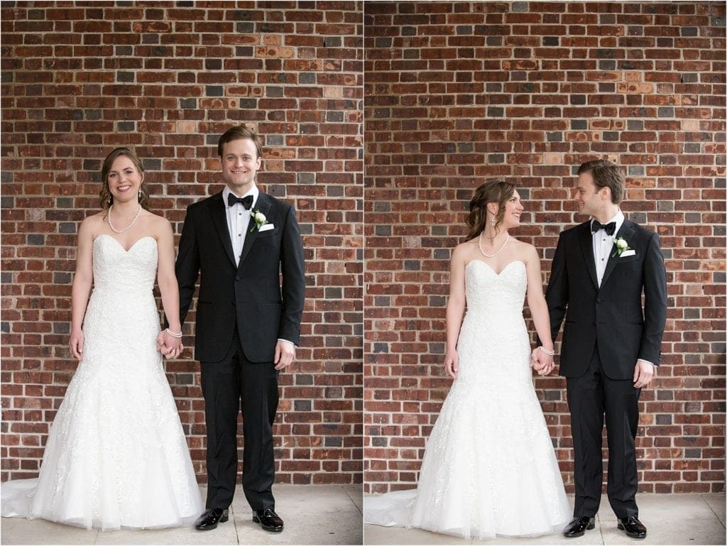 bride and groom photos in front of brick wall giving it an urban city feel