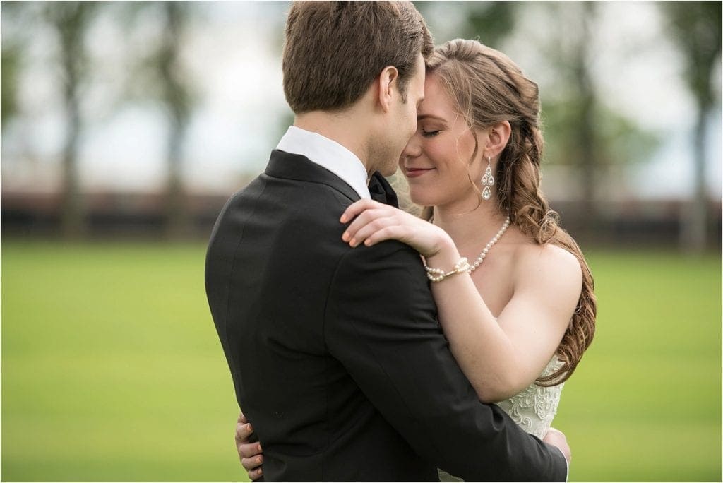 sweet moment between groom and bride for first look pictures