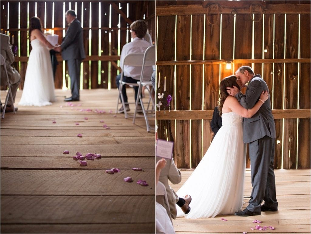 rustic barn for wedding ceremony, first kiss