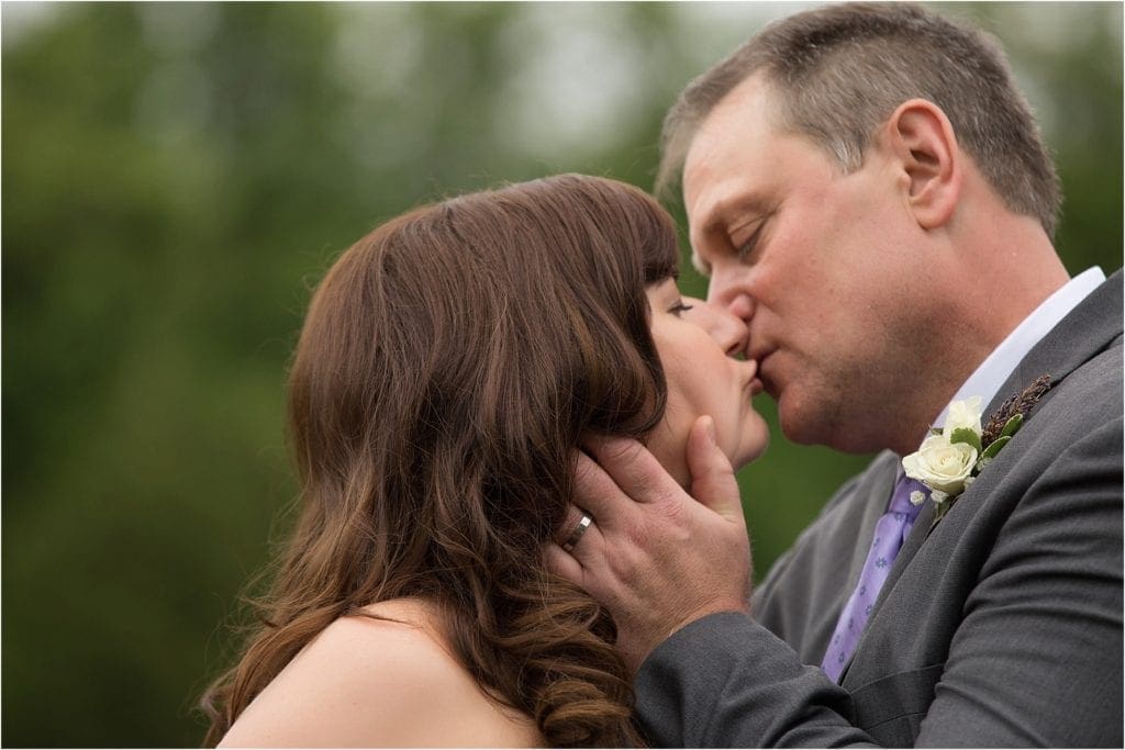 first kiss - Barn at Forestville Wedding pictures. photos by Ashley Gerrity Photography