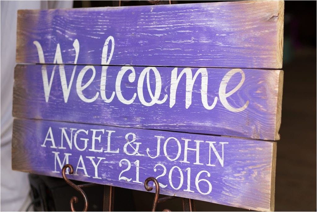 purple wooden sign for rustic wedding