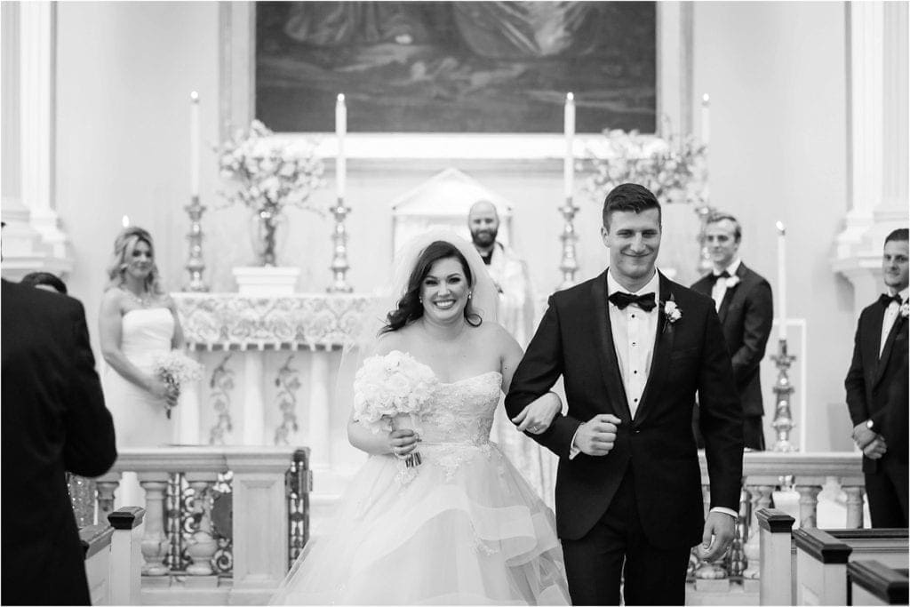 bride and groom exiting Old St. Joseph's is the church