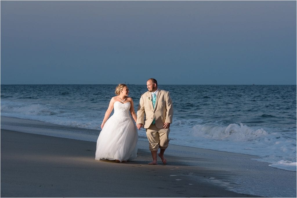 Cape May Beach Wedding of bride and groom walking on the beach