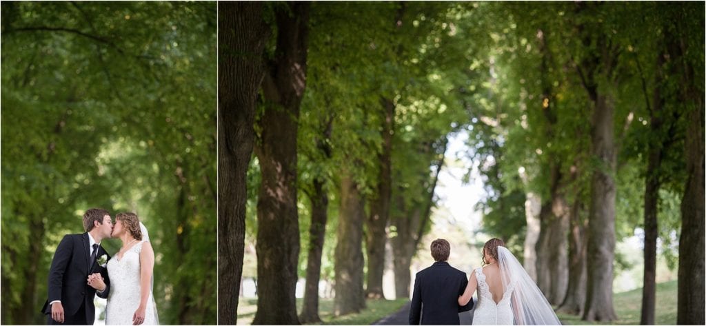 photos of Wedding at the Berkshire Country Club in Reading Pennsylvania- gorgeous picture of bride and groom in walk way of tall trees