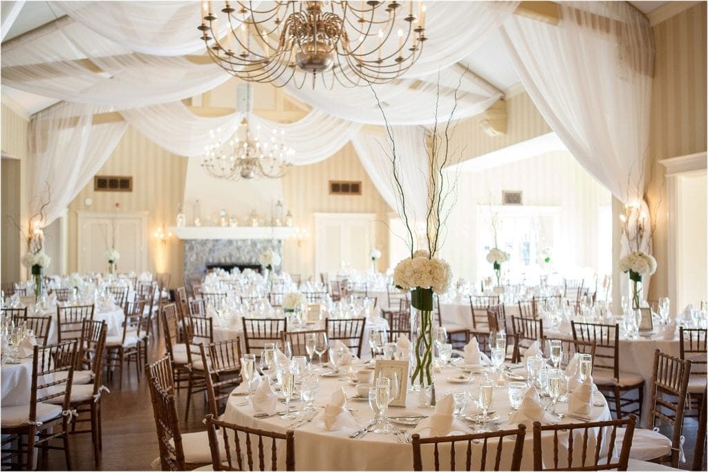 Berkshire Country Club wedding photos of reception all covered in white linen decor. So pretty.