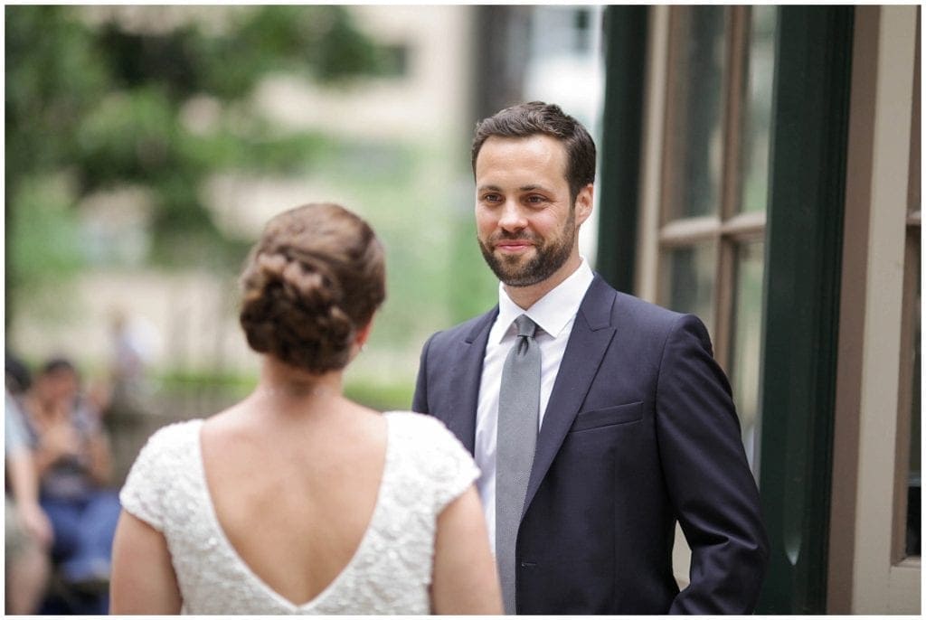 First look groom reaction to his gorgeous bride wearing vintage dress in Philadelphia 