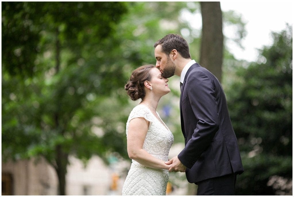 sweet pose idea for couple during their bridal portraits at Rittenhouse Square