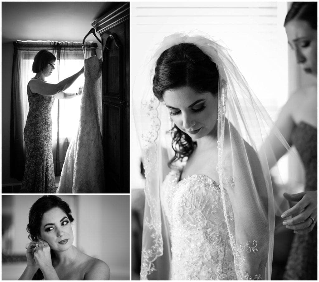 Black and white portraits of bride getting ready and putting on gorgeous veil and beaded wedding dress.
