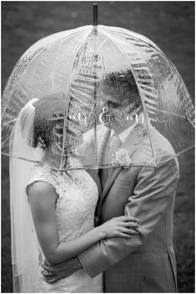 Rain can make for romantic photos on wedding day- wedding at La Massaria 