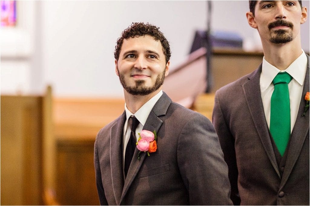 Grooms reaction to seeing bride walking down the isle