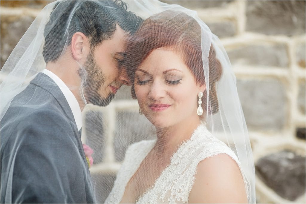 Brick Gables Lancaster Wedding romantic photo of bride and groom - love the brick wall