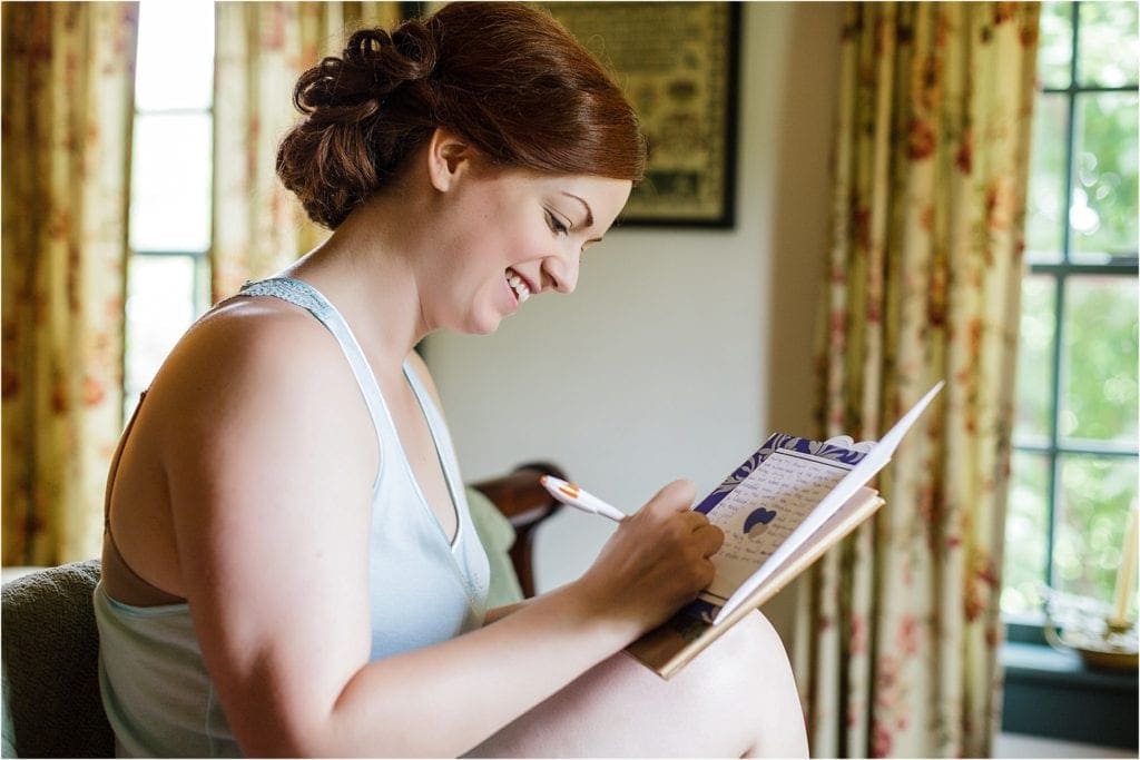 Brick Gables Lancaster Wedding photos- bride writing card for groom