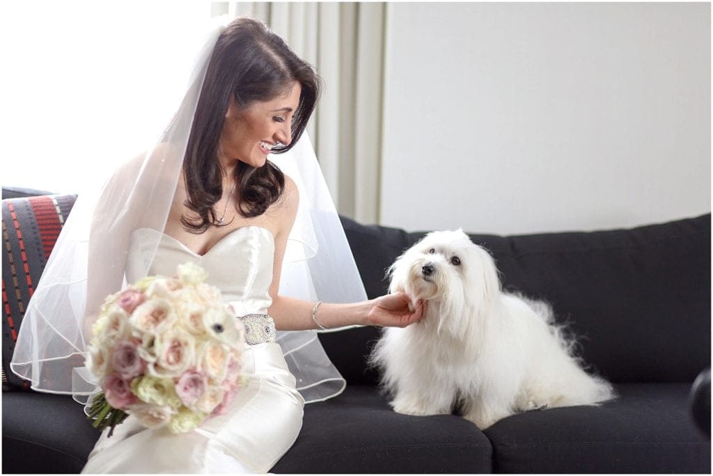 Bride getting ready with her puppy is the sweetest thing