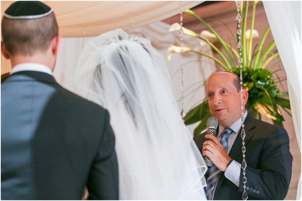 Photo of Rabbi during Jewish wedding ceremony 