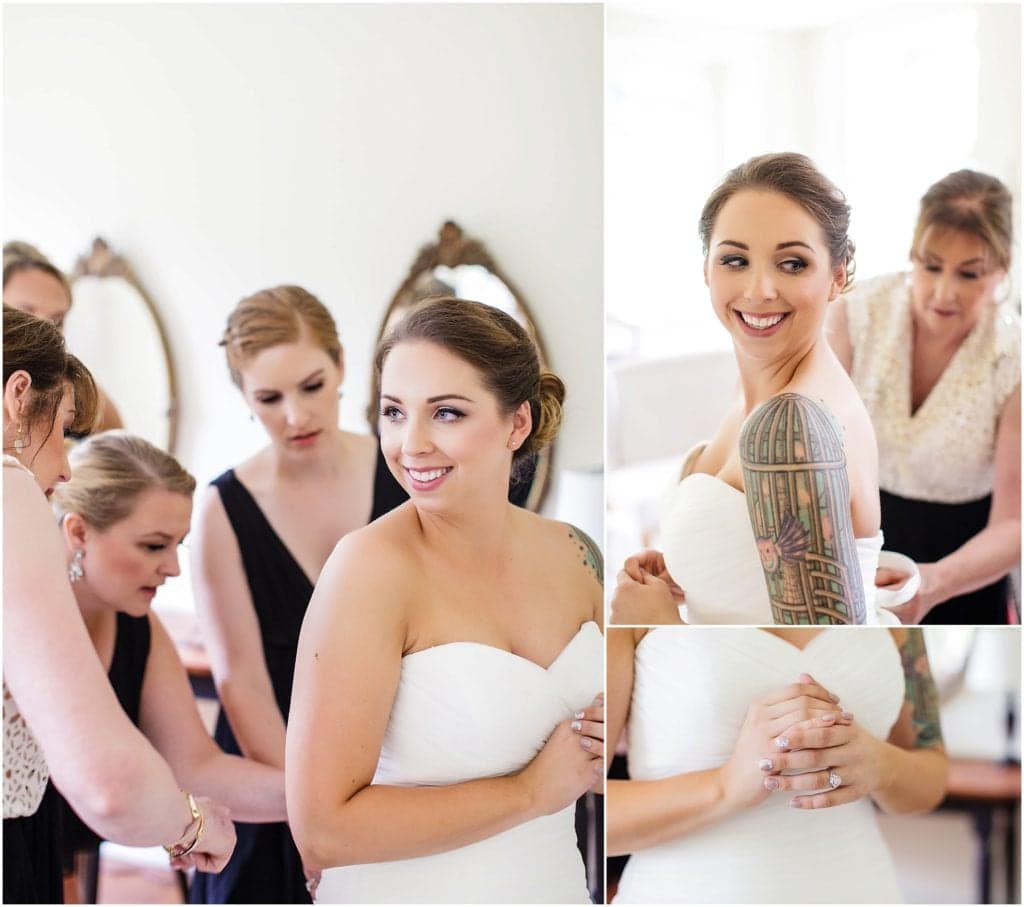 Tattooed bride getting ready - love her dress from The Dress Matters