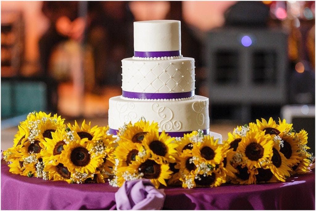 photo of purple and white wedding cake 