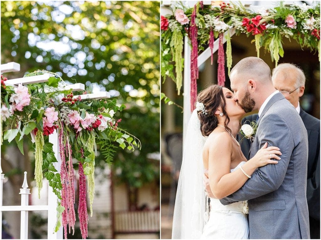 How pretty are these hanging flowers for this outdoor wedding ceremony at Joseph Ambler Inn