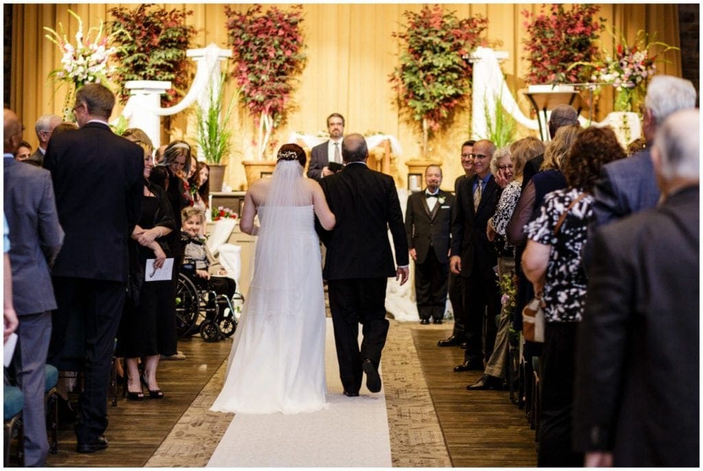 Photo of Bride walking down the aisle at Covenant Fellowship Church 