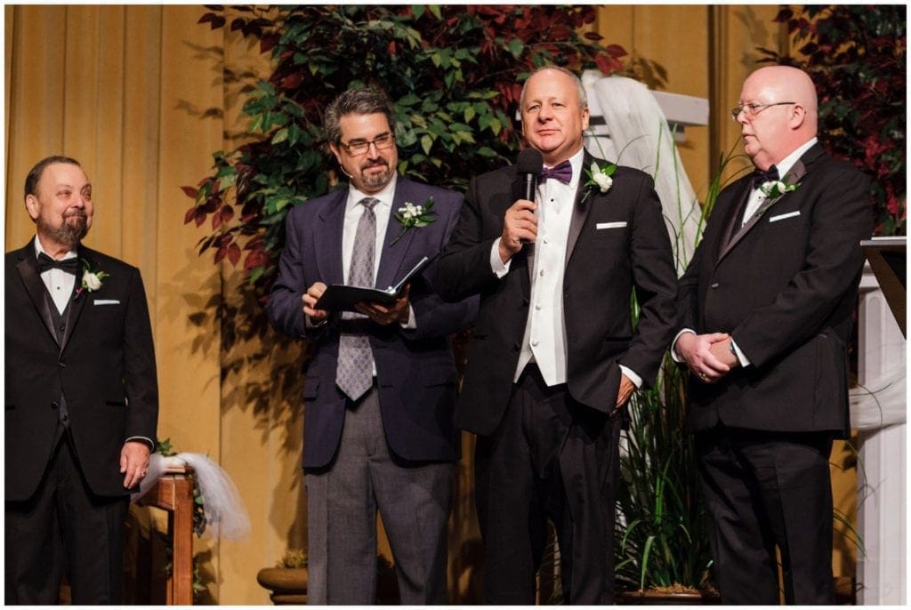 Autumn wedding and prayer during ceremony at Covenant Fellowship Church 