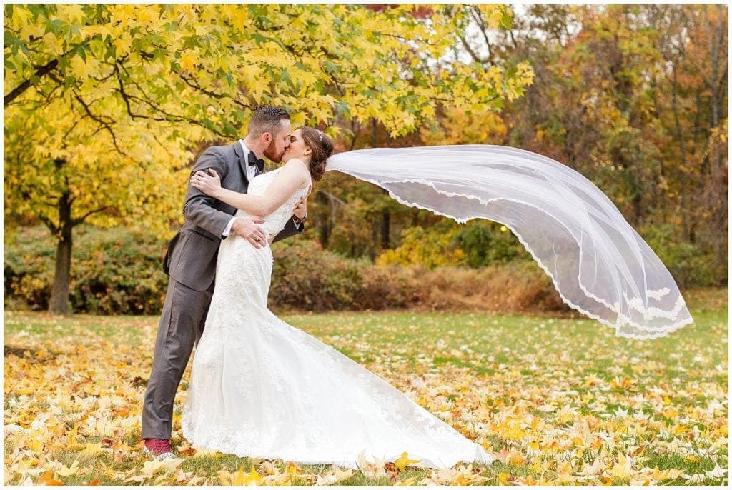 Kimberlee's veil that her mother made for a little ride on the breeze. The perfect fall scenery for a NJ rustic wedding 