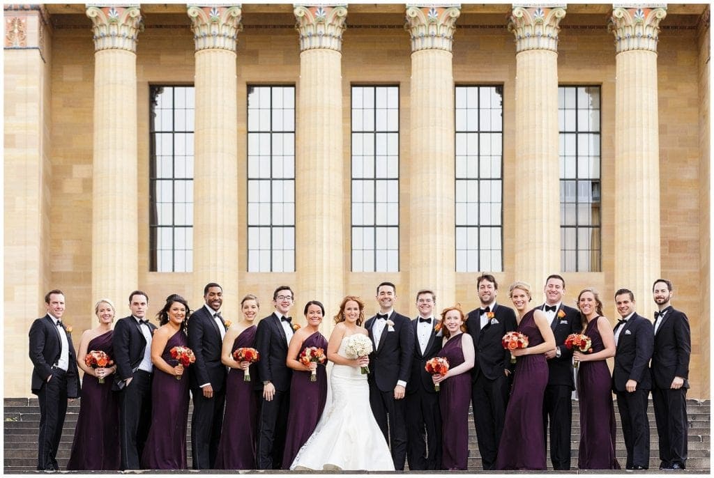 Eggplant and orange wedding colors, bridal party photos at the famous steps in Philly 