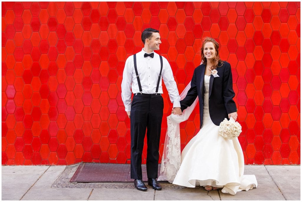 The Philly streets are magical for wedding day pictures, love this casual vibe of this wedding couple 