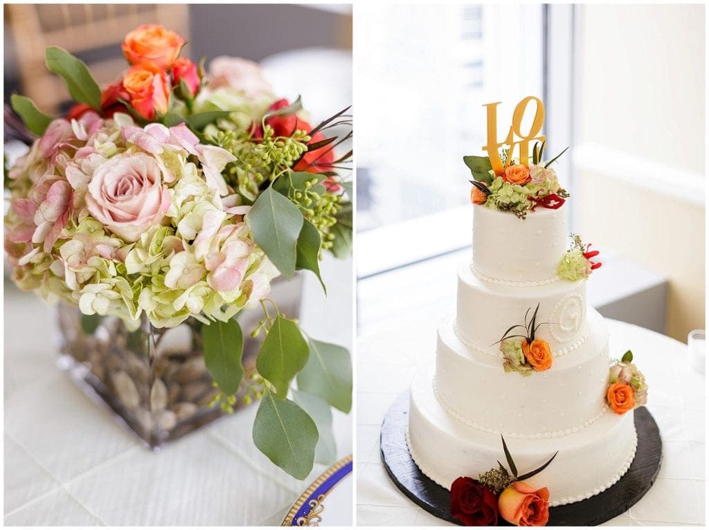 Unique cake toppers for Philly Weddings using the Love sign, orange flowers 