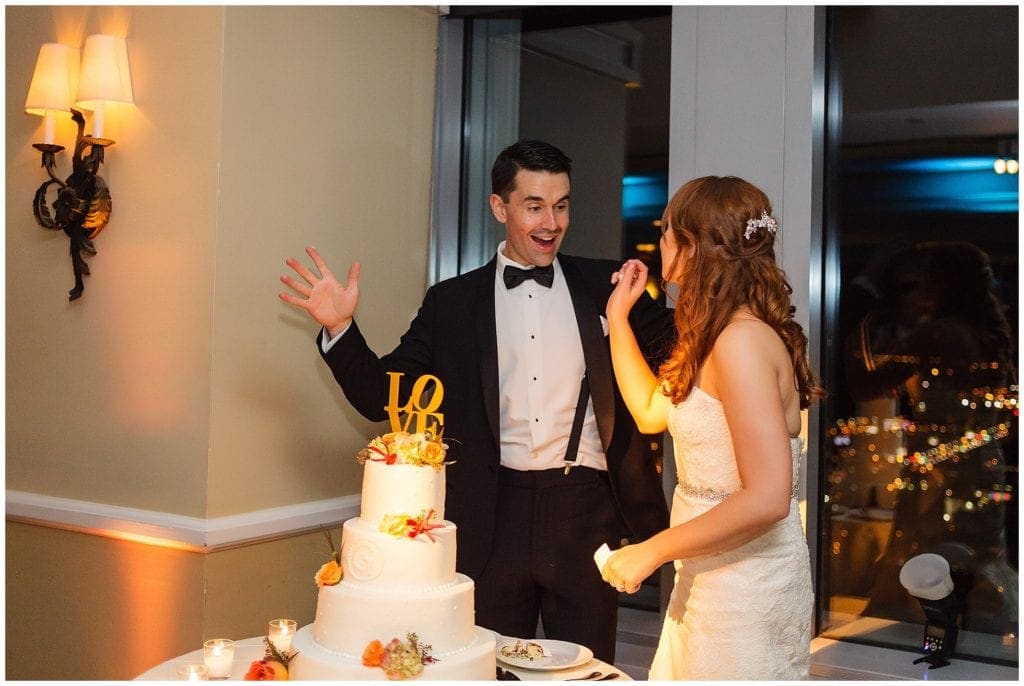 Cake cutting time for this Elegant Philadelphia Wedding  at the Pyramid Club