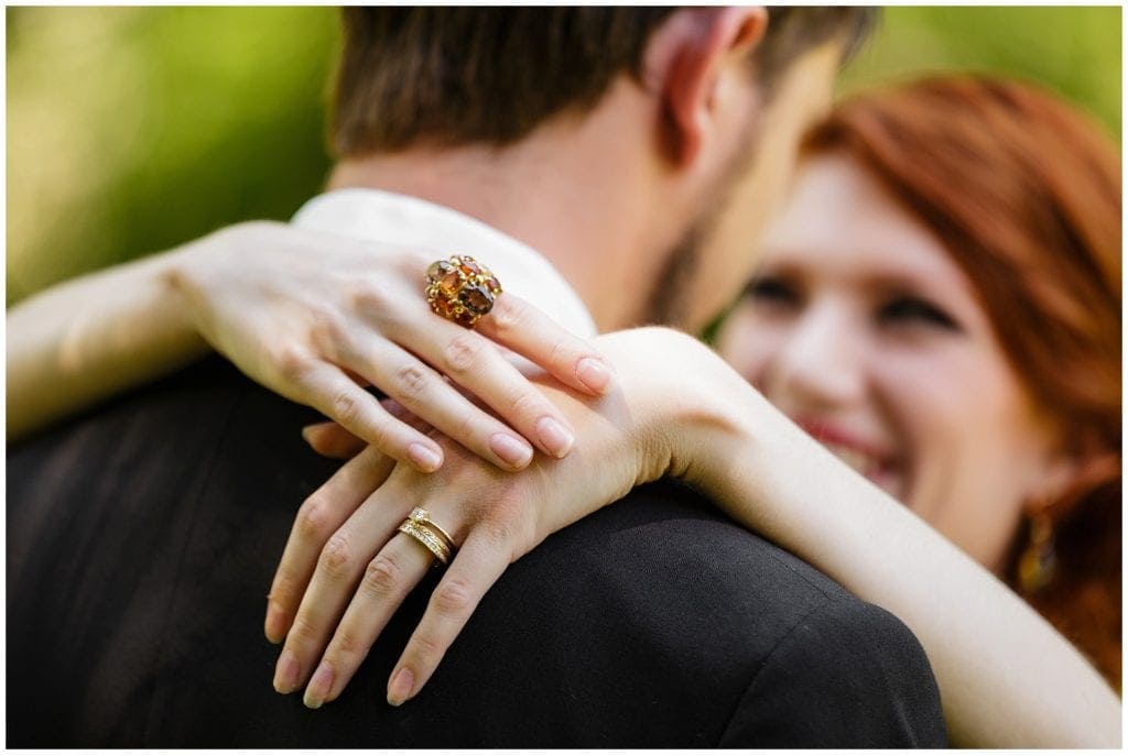 smiling bride with groom, love her jewelry - photos by Ashley Gerrity Photography- Bolingbroke Mansion