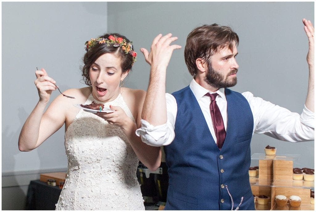 funny cake eating photo during wedding 