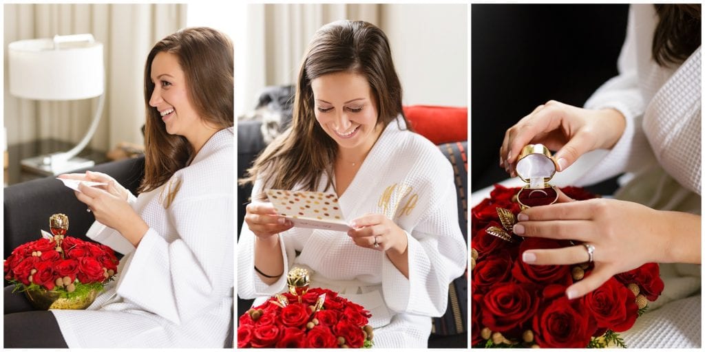 Bride receives unique gift on top a bouquet of red roses. Loews Philadelphia Hotel
