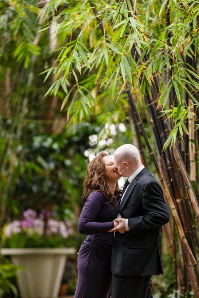 Intimate Engagement Photo of kissing couple at Longwood Gardens