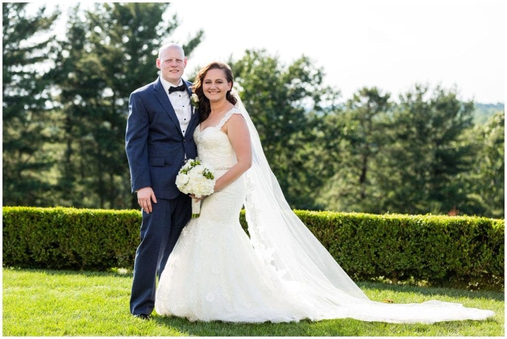 A traditional wedding portrait on the golf course at their Trump National Philadelphia wedding.