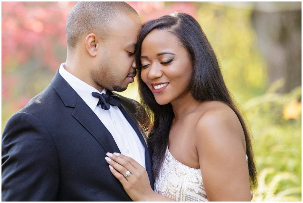 Alexandra & Joey embrace during a private moment in their high fashion Longwood Gardens engagement session.