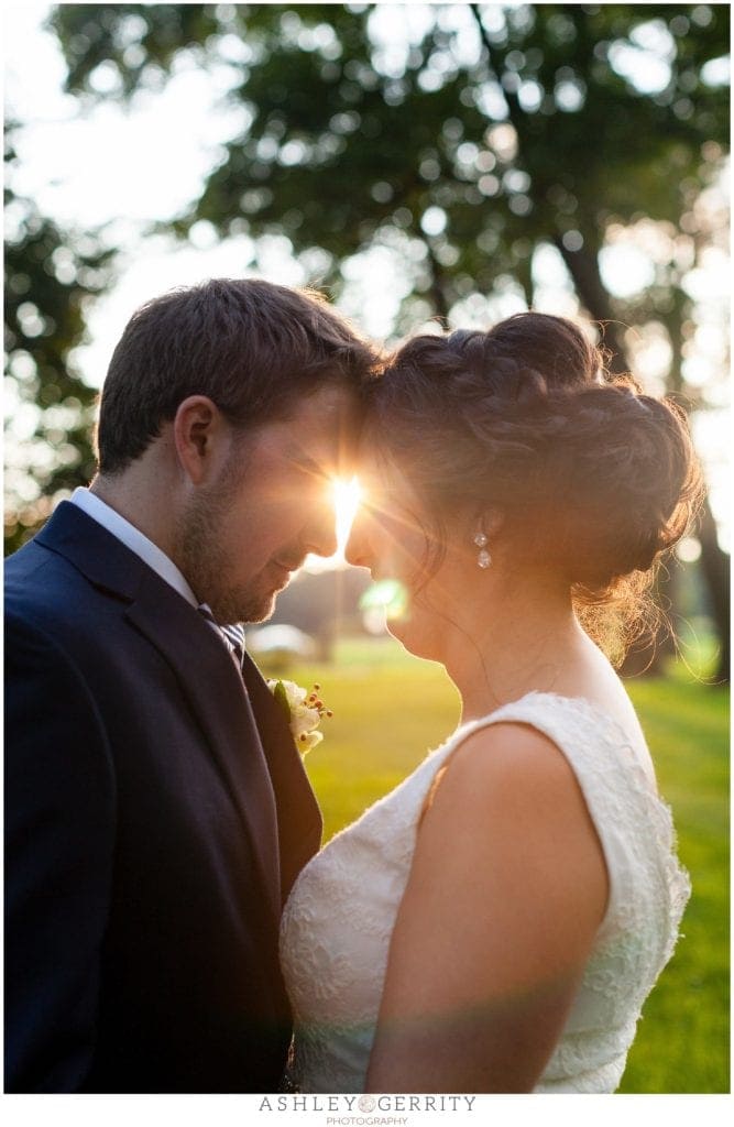 Bride and groom, intimate portrait, sunburst, sun flare, magic hour 