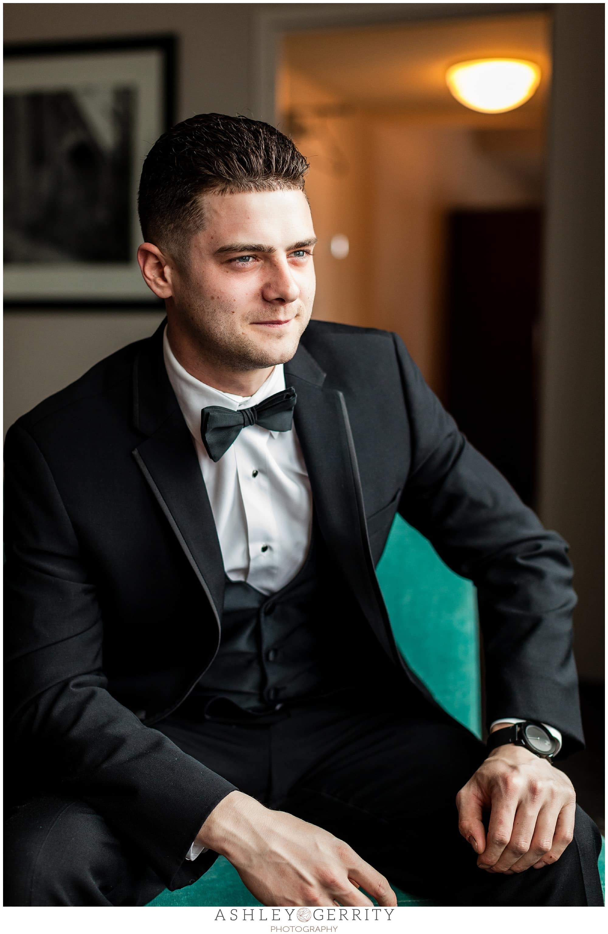 groom portrait dressed in tuxedo before wedding