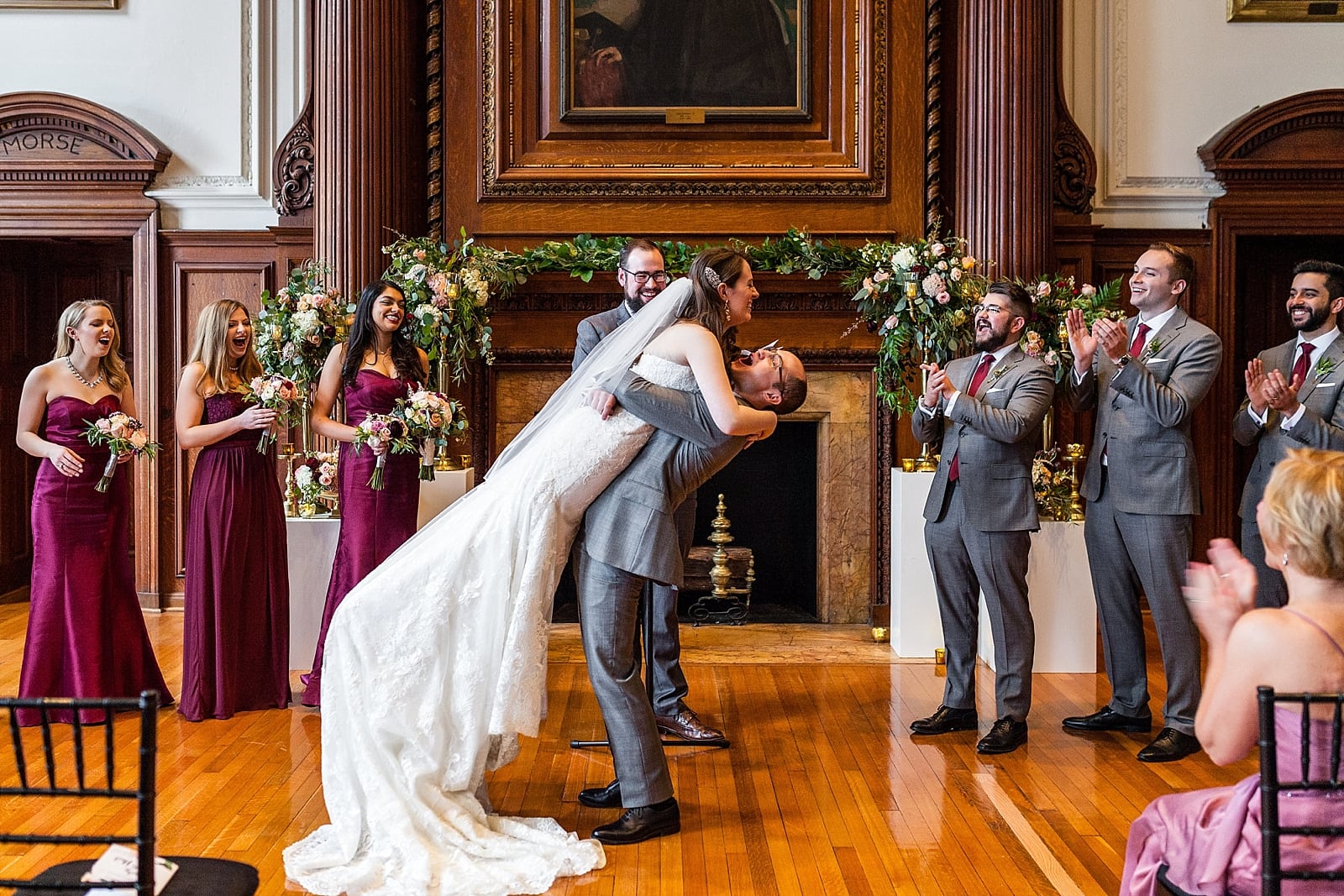 Groom lifting bride during wedding ceremony and celebrating, College of Physicians wedding 