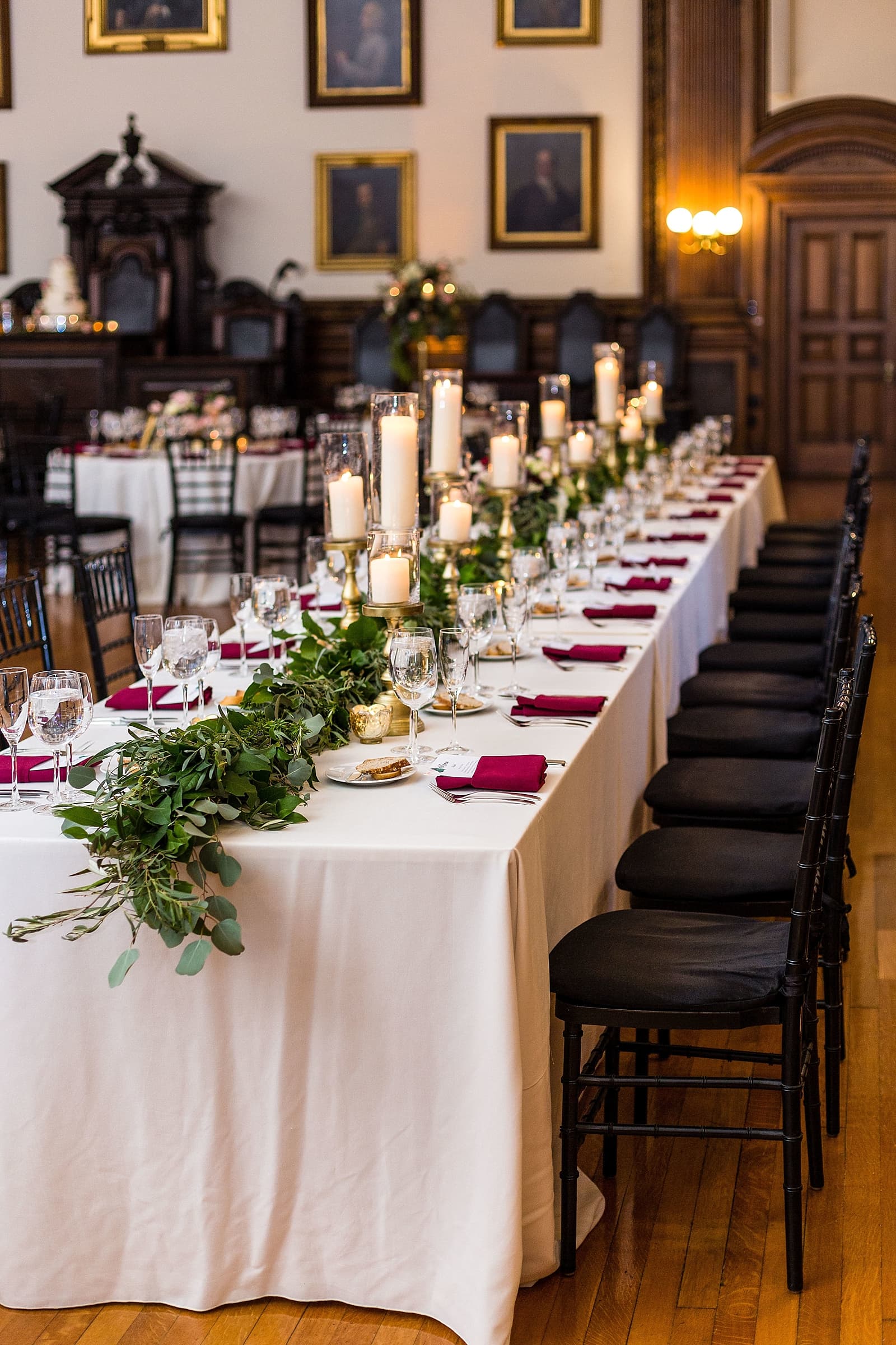 Floral table and gold candles details, college of physicians wedding